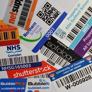A variety of asset labels printed by Custom Labels in Bridgwater, UK.